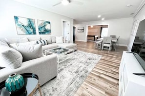 Spacious Modern Living Room w/ Large Sofa & Smart TV