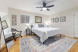 Our Primary bedroom is complete with a King-size bed, closet, dresser, Roku TV and en suite bathroom.