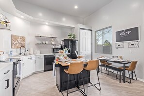 Large open kitchen with every amenity possible! Basic spices, condiments, etc.
