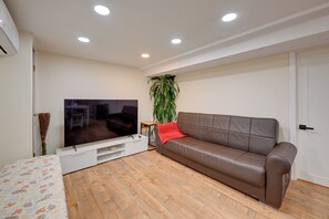 Living Room | Smart TV | Home Theater System | Board Games & Books | Futon