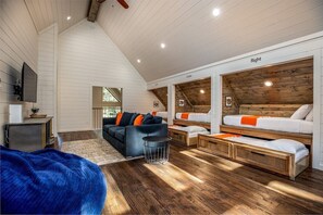 Enclosed Loft Bedroom 3 sleeps 6 with no bunks. Sofa, TV, games - perfection!