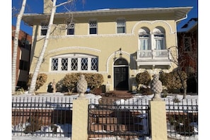 Front of the house viewed from Race Street (note pineapples on front gate!)