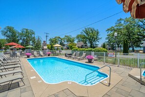 Swimming pool and lounge chairs