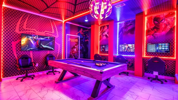 Spider-Man themed game room with pool table, gaming PCs, and epic decor!