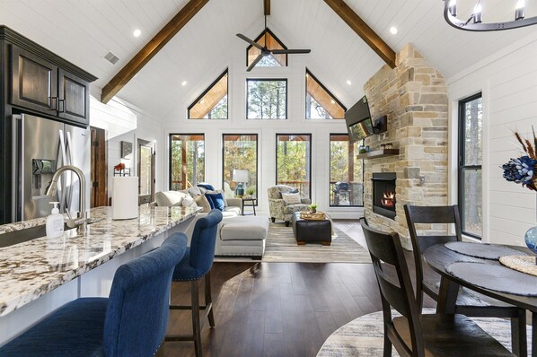 Beautiful open floor-plan with floor to ceiling windows.
