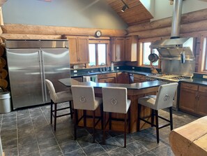 Fully stocked kitchen with coffee bar, Keurig machine, toaster and blender.  