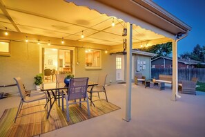Covered exterior patio with seating