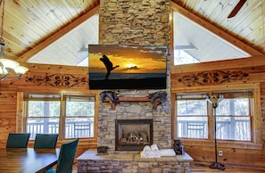 Largest TV in Town! - View of living room and fire place