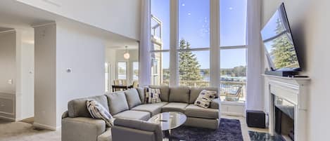 Living room with views of Lake Lanier and the marina. 