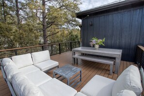 Large area for lounging and dining on the west side of the back deck.