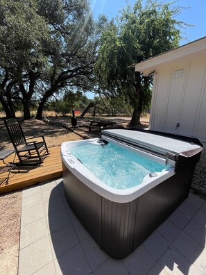 Soak in the new hot tub for four.