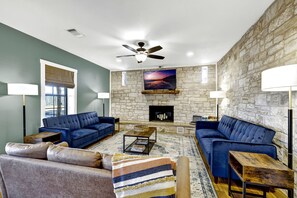 Sink into the comfortable couches to enjoy the fireplace or TV.