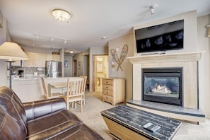 Living Room,Indoors,Furniture,Screen,Fireplace