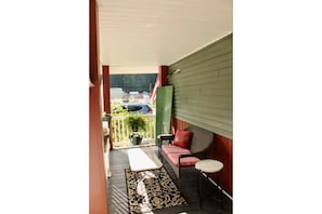 Enjoy West Virginia fresh air and star-gazing from the covered side porch.