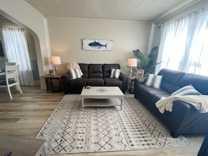 Main living area with 50" smart tv.