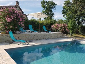 Pool, terrace and chapel behind