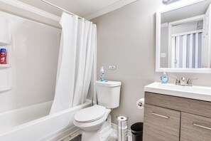 Stunning Bathroom Stocked w/Toilet Paper, Body Wash, Shampoo, & Other Essentials