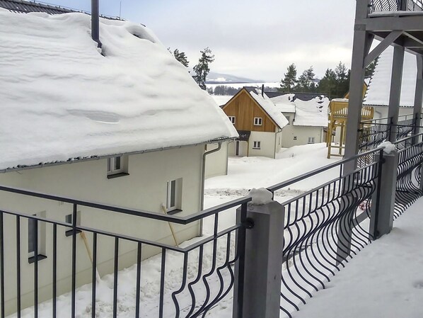 Sky, Snow, Property, Building, Window, Fence, Lighting, Freezing, Tree, House