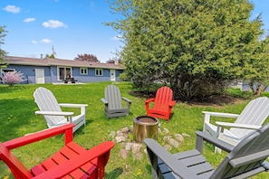 Expansive yard for all to enjoy games and evenings around the fire with seating for 6