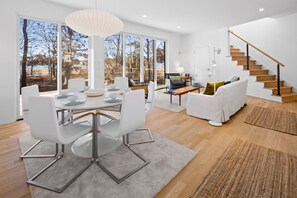 Open living & dining floor plan with marsh views