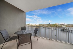 Relax on your second-floor balcony and enjoy the lake.