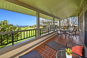 Lounge-ready balcony with tropical surroundings. KRV-1223