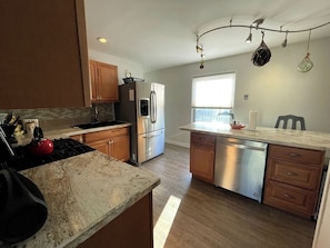 Full Kitchen featuring Island Seating for 2