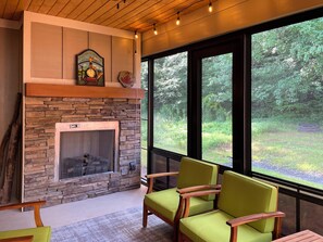 Sunroom Fireplace will keep you warm during those cool mountain days & nights. 