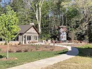 Common Area -  gas grill, firepit and Adirondack chairs. Available to guests.