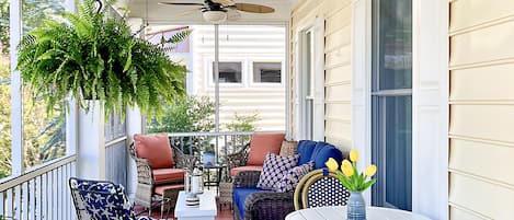 Large screened in front porch. Our favorite spot to hang out & relax.