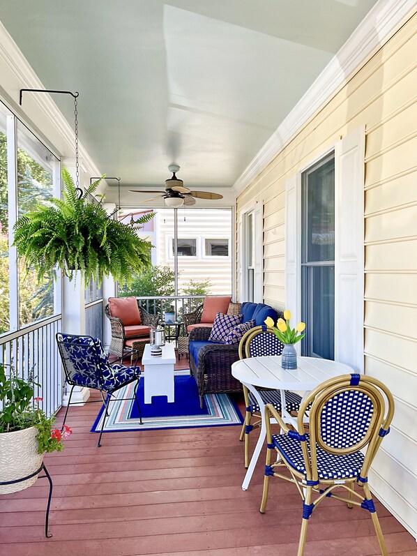 Large screened in front porch. Our favorite spot to hang out & relax.