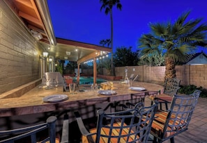 Outdoor grill and island to entertain