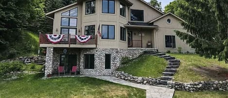 4 bedroom/3 & 1/2 bath walkout with 50 feet on lake Charlevoix 
