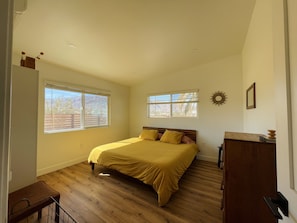 Spacious room with a comfortable king