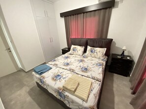 There is a king size bed (140x120 cm), and big wardrope in the master bedroom.
