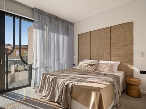 Bedroom with a Queen size bed (1,80 X 2,00) with a mattress topper that could also be set us as 2 single beds (0,90 X 2,00) upon request