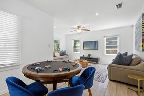 Our kitchen dining table doubles as a poker table. Perfect for entertaining! 