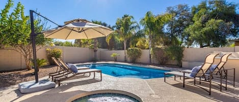 Bask in the sunlight by the pool