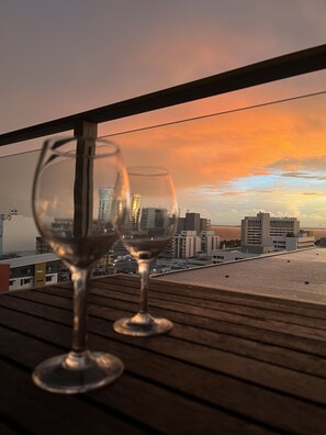 Drink and enjoy the sunset view at the balcony.