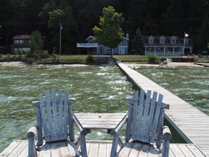 OVERALL:  The chairs and table that are at the end of the dock.