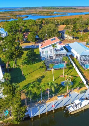 Hernando beach water views, dock, lanai & pool, grand yard, decks, firepit.
