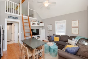 Open living area to relax and enjoy
playing provided games or watch Smart TV