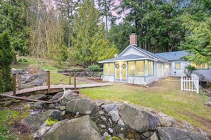 Enchanting Forest Cottage on 5 acres with semi-private beach access.