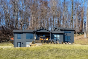 The home and the hillside. Dual sitting areas- front porch and side balcony.