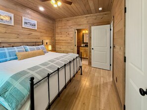 Primary bedroom closet and ensuite full bathroom.