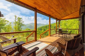 Enjoy the magnificent views from the wraparound porch! Propane grill