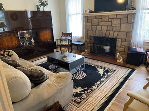 Enjoy the fireplace while you watch catch up on your favorite series.