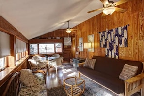 Enjoy the garden view from the sunroom.
