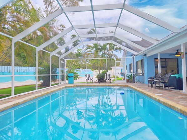 Huge 22000 Gallon Sparkling Pool with Newly Tiled Lanai and Tropical Views!