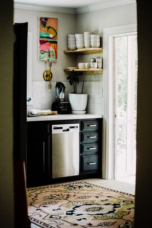 the kitchen overlooks the two tier back deck & back screened in porch 